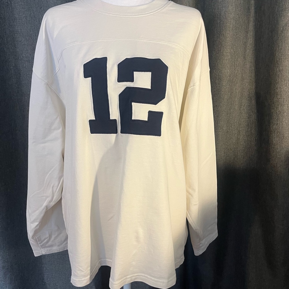 TNA Cream Jersey with Black Number